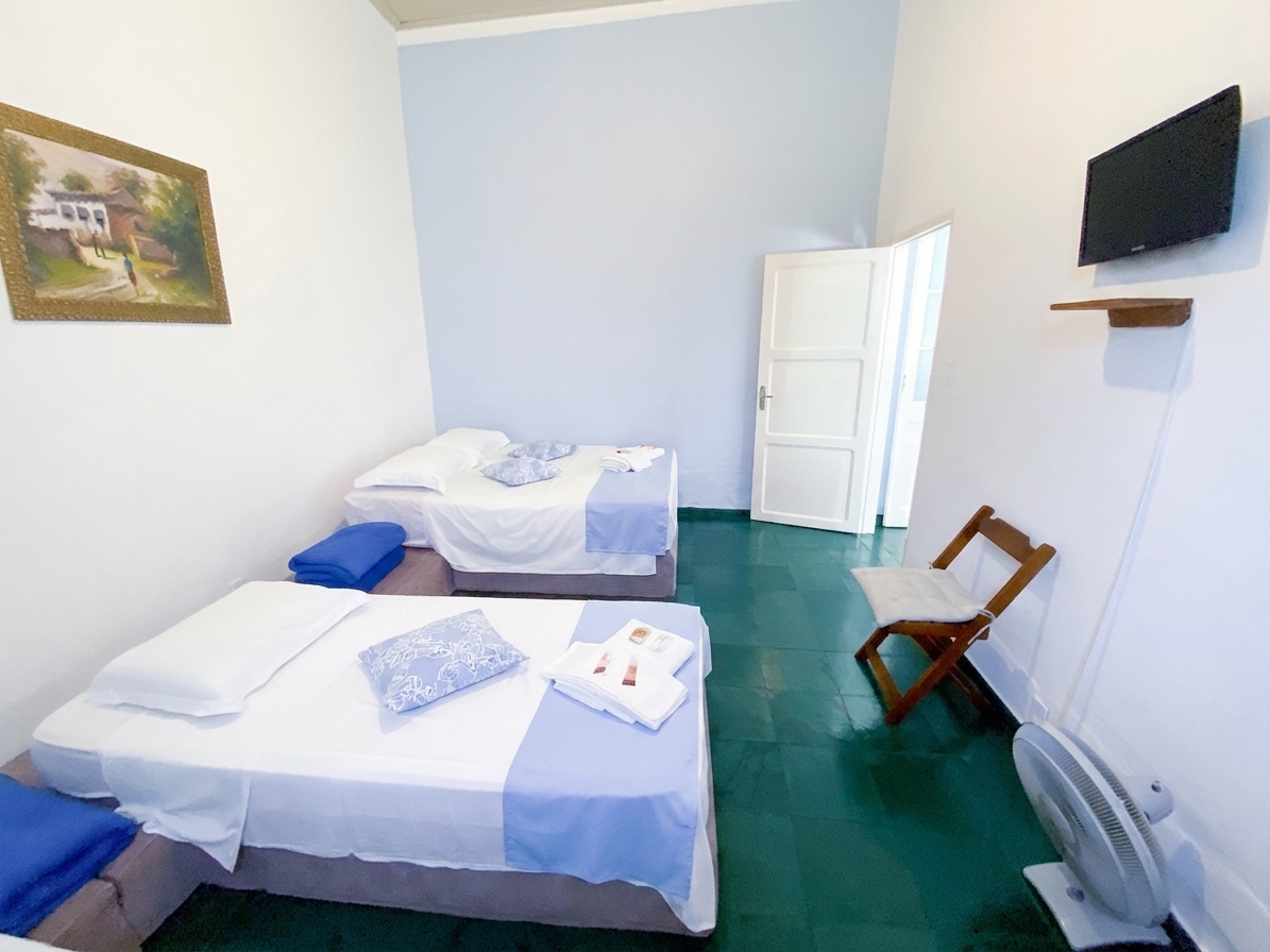 Quarto com camas de solteiro